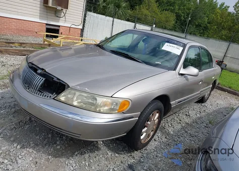 2002 Lincoln Continental z USA, uszkodzony, nr VIN 1LNHM97V12Y697403
